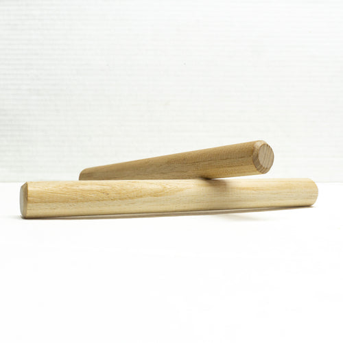 Two wooden hickory pegs for timber framing