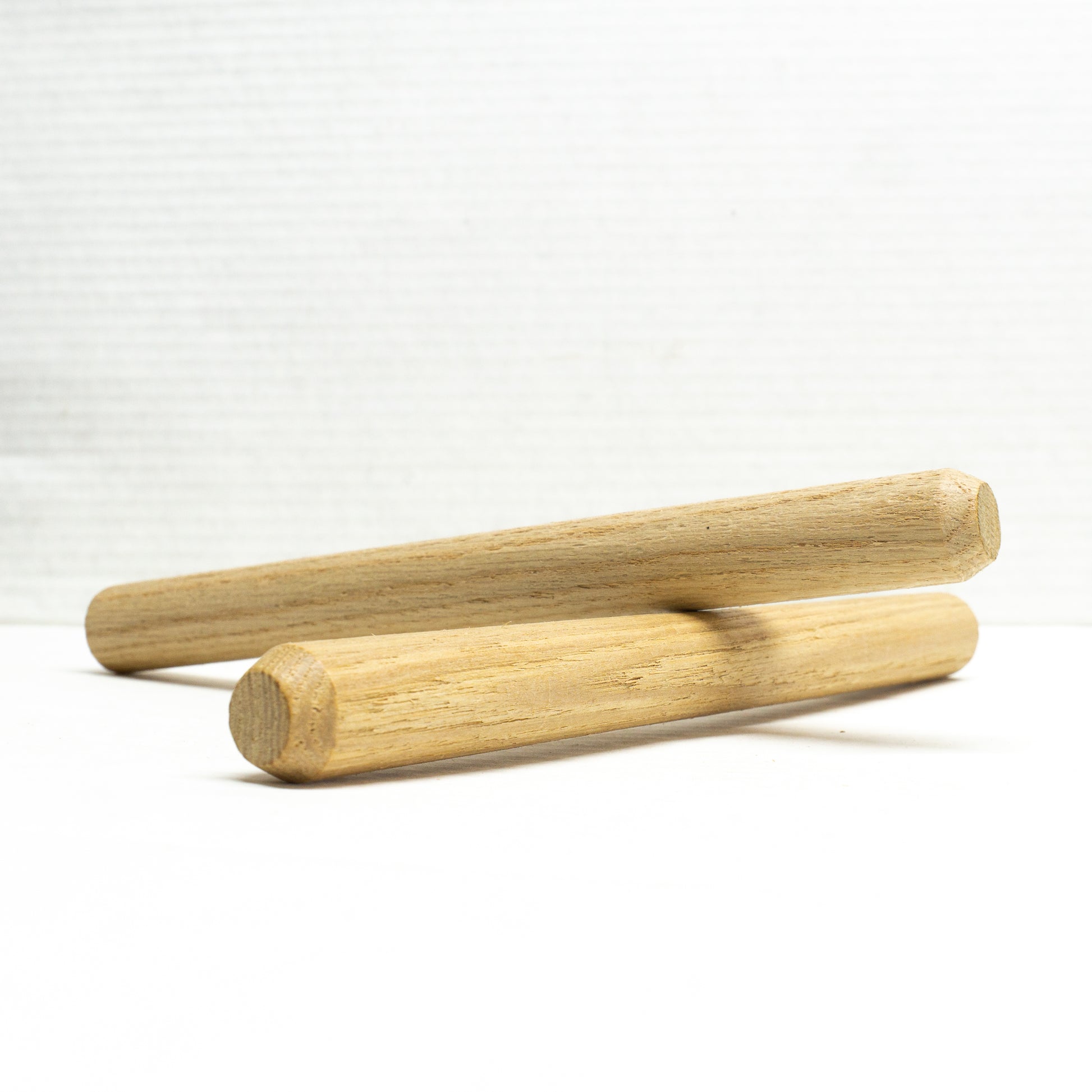 Two Red Oak Single Chamfer Pegs